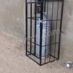 Propane cylinder in cage